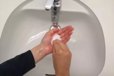 washing hands step 7
