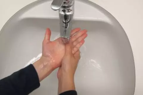 washing hands step 8