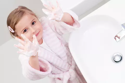Child showing hands