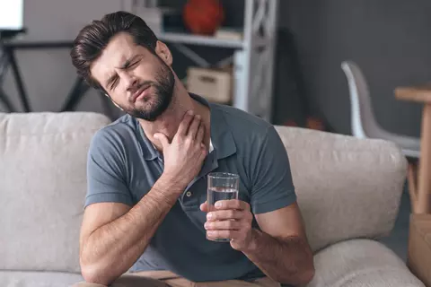 Man with a sore throat